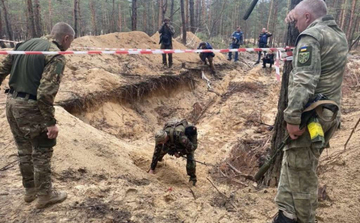 JOŠ JEDNA  LAŽNA VIJEST -SKY NEWS Ovako navodno izgleda "masovna grobnica" kod Izjuma,a to je u stvarnosti ovako /FOTO/